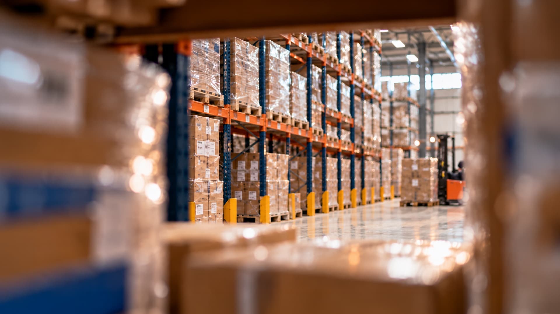 Warehouse racks stacked with pallets of surplus stock